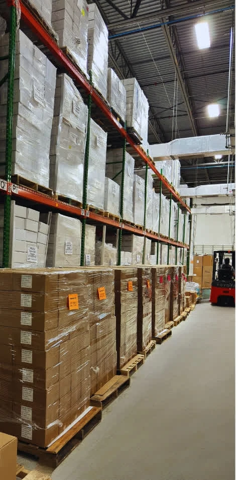 Pallet racking and finished-goods inventory in the YourSupplementsPartner warehouse